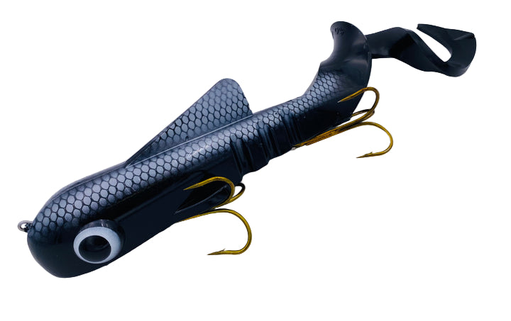 Black and gray fishing lure with gold hooks on a white background