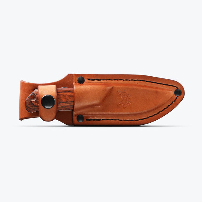 Knife with a wooden handle on a white background